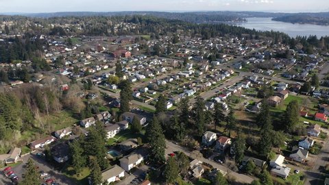 Cinematic aerial drone footage of Bremerton, Manette, Waterman, Sinclair Inlet, Puget Sound in Kitsap County, Washington State