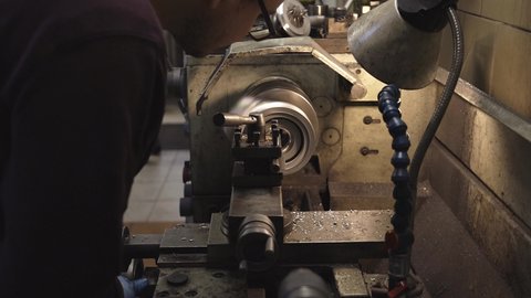 Working man repair the car turbocharger