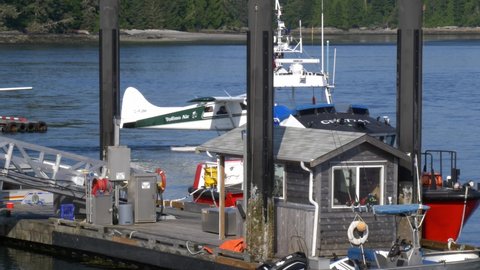 Tofino, BC, Canada - August 4, 2019:
A seaplane taking off for spectacular sightseeing in the area