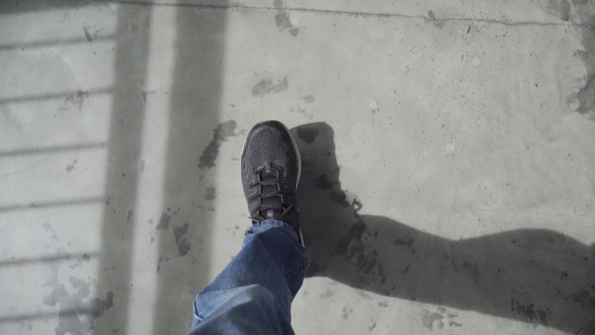 Walking on concrete floor. First person point of view. | Shutterstock HD Video #1069172698