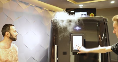 Man during cryotherapy in a special capsule