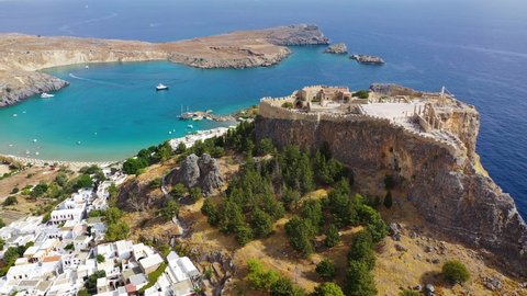 Ruins of Acropolis of Lindos view from above, Rhodes, Dodecanese Islands, Greek Islands, Greece. Acropolis of Lindos, ancient architecture of Rhodes, Greece. 