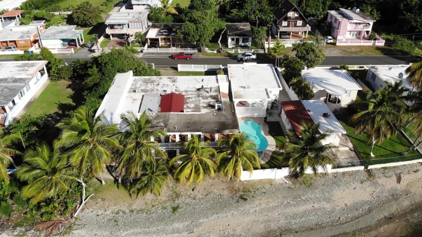 Drone shot while flying sideways over a beach in the southeast part of Puerto Rico.