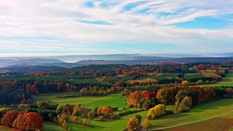 Aerial view of German Black Forest in autumn, colorful trees and grassland Stockvideó