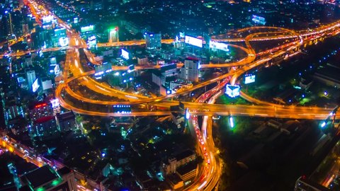 Expressway Night Cityscape Time Lapse Of Bangkok City, Thailand (zoom out)