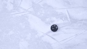 Hockey Stick Hitting Hockey Puck in Slow Motion. Close-up on Ice. 4k. Top view - Powered by Shutterstock - Get 15% off with code: PIKWIZARD15