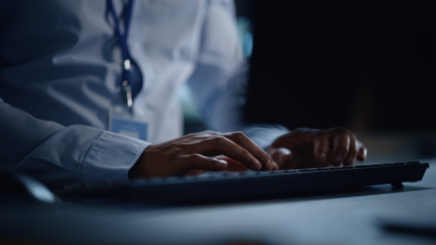 Close Up of a Professional Office Specialist Working on Desktop Computer in Modern Technological Monitoring Control Room with Digital Screens. Manager Typing on keyboard and Using Mouse. Royalty-Free Stock Footage #1069211344