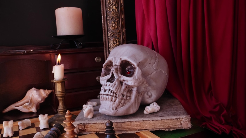 allegorical still life in the baroque genre Vanitas, a skull on a book, chess, candles are burning, concept of the transience of life, the futility of pleasures and inevitability of death