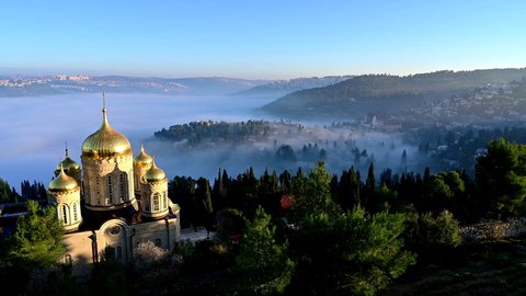 Beautiful view of the Gorny or "Moscobia" Convent - Russian Orthodox Church and the Judean Hills, with the Ein Karem neighbourhood of Jerusalem hidden in the morning fog