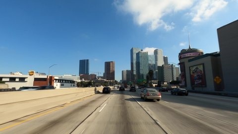 Los Angeles Downtown California USA - January 2020 Drive with panorama of downtown, increasing rush hour traffic interstate 110 or i-110 with massive highway intersection and interchange freeway