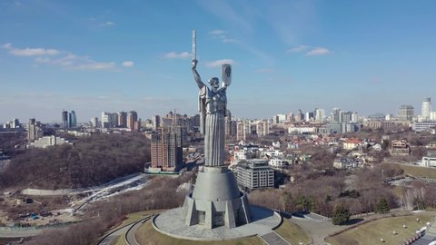Kiev, Ukraine : a monument to th Motherland in Kiev.Historical sights of Ukraine. Release Drone view 4K Departure from the Monument of the Motherland mother in Kiev, Ukraine