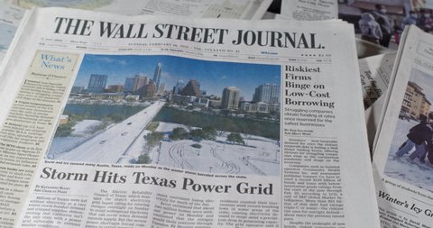 New York, New York  United States - February 10,  2021: Newspaper Coverage of Texas snowstorm wreaks havoc on state power grid