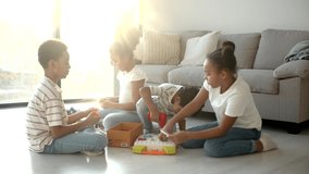 African American kids play educational toys at home