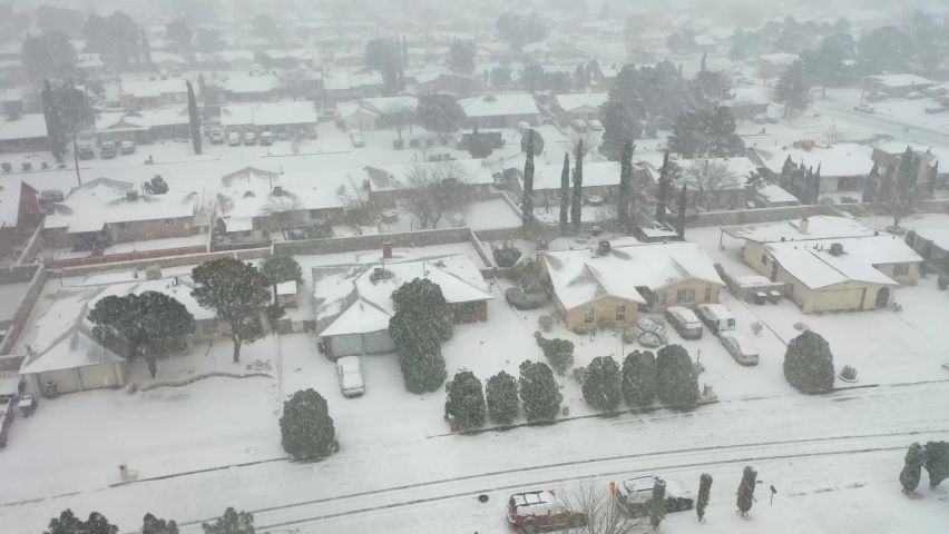 El Paso, Texas USA: Circa March 2021  
Aerial view of an El Paso, Texas residential area during a rare snow storm.