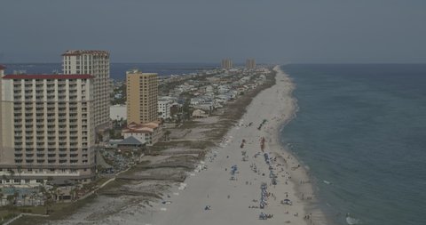 Pensacola Beach Florida Aerial v7 pull out over the beach and past the ball tower towards the marina - Shot with Inspire 2, X7 camera - March 2020