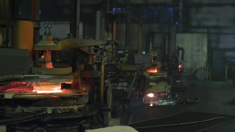 Automatic production of blanks for the production of glass-blowing products at the plant, the work of the conveer at the plant, the working process at the factory