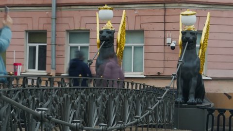 Bank Griffins Bridge in St. Petersburg, the crowd of people rushing sightseeing, blurred motion, panorama, time lapse