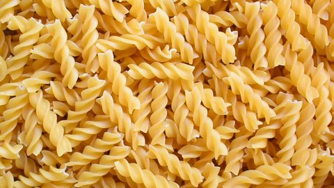 Uncooked whole dried Fusilli pasta