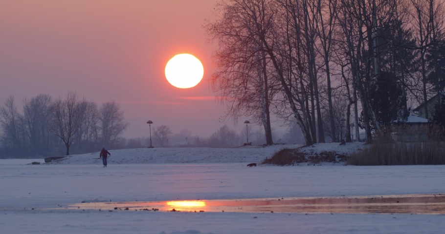 Sunset on the frozen Soderica lake, Croatia
