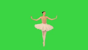 Wide shot. Ballerina walking on tiptoes and waving hands on a Green Screen, Chroma Key. Professional shot in 4K resolution. 069. You can use it e.g. in your medical, commercial video, business, prese