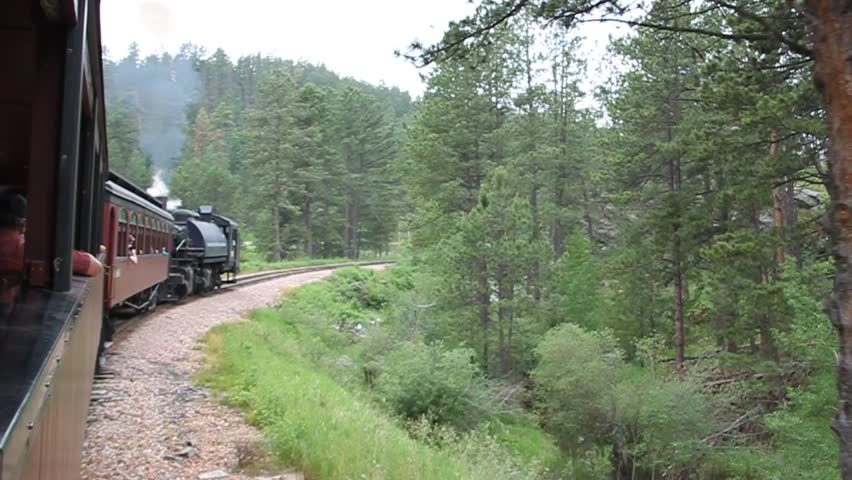 South Dakota, USA - July 5, 2015: Passenger train traveling through the Black Hills, view from passenger window. 