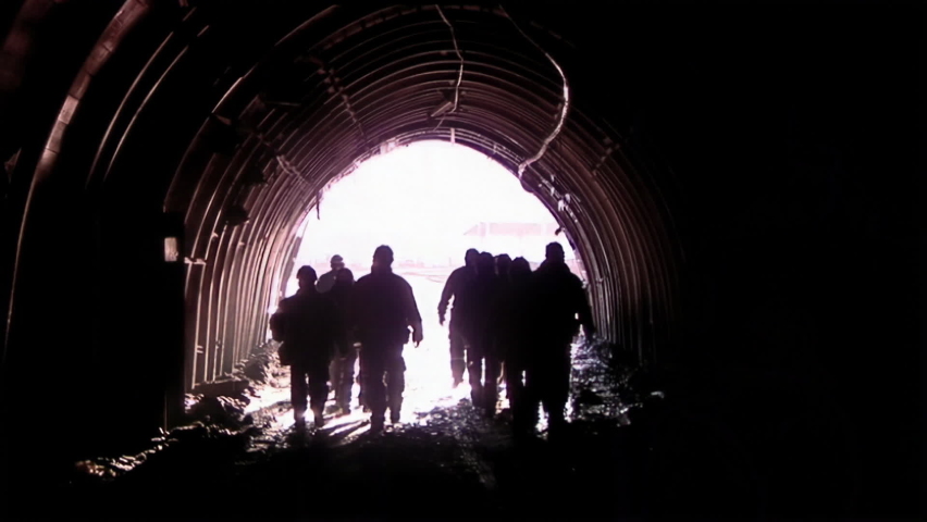 Silhouette of Miners leaving the Coal Mine in Patagonia, Argentina. Royalty-Free Stock Footage #1069329292