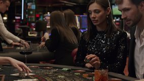 blackjack players place their bets at an elite casino. Gambling, nightlife - Powered by Shutterstock - Get 15% off with code: PIKWIZARD15