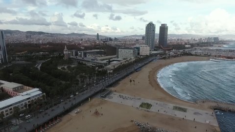 Barcelona, Spain - December 10, 2020: Aerial Shot of Beach in Barcelona and City. Empty Beach Due to Pandemic Covid-19. Barcelonetta Beach.