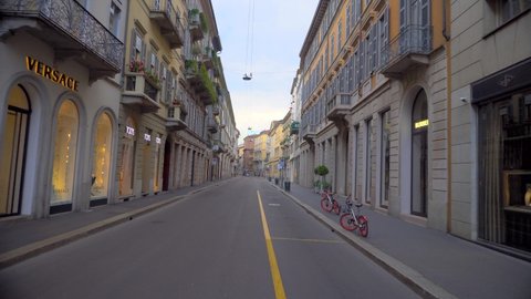 Milan, Italy, March 2021: Deserted narrow streets in the city center. Quarantine in Lombardy during the second Covid19 pandemic. People are sitting at home. Public transport without people. Lockdown.