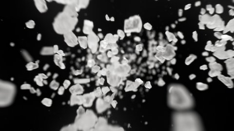 Super Slow Motion Detail Shot of Salt Falling on Black Background at 1000fps.
