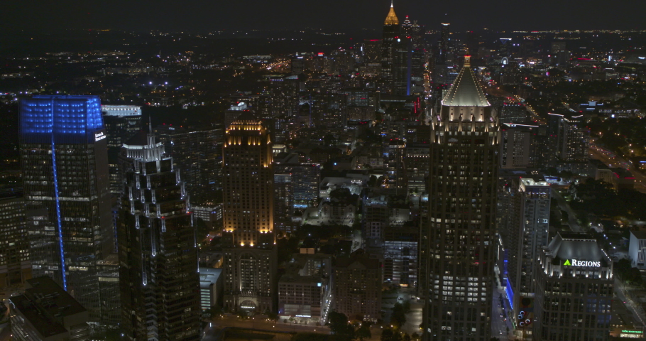 Atlanta Georgia Aerial v730 dolly out shot of midtown and freeway at night - Shot with Inspire 2, X7 camera - August 2020