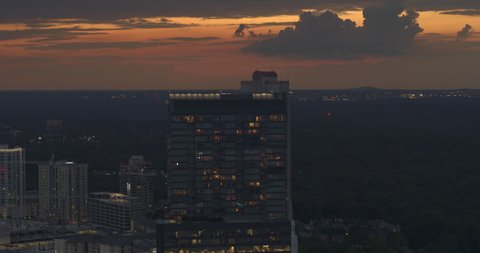 Atlanta Georgia Aerial v713 pan left shot of cityscape and orange sky at dusk - Shot with Inspire 2, X7 camera - August 2020