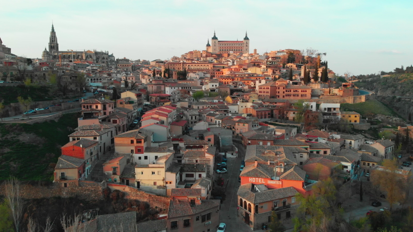 Toledo, Spain - March 20, 2021: Aerial drone point of view historical city of Toledo. Castilla–La Mancha. Travel and tourism, famous tourist attraction place concept. Spain. Europe