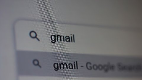 Buenos Aires, Argentina - March 2021: Searching for "Gmail" in an Internet Search Engine on a Computer. Close Up. 4K Resolution.