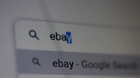 Buenos Aires, Argentina - March 2021: Searching for "Ebay" in an Internet Search Engine on a Computer. Close Up. 4K Resolution.