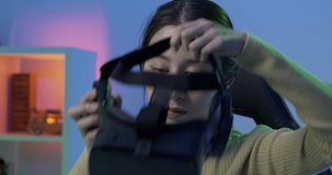Young woman wearing interactive VR headset. female VR headset user on digital interactive art performance, entertainment of future.