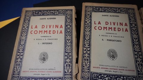 Rome, Italy - March 21, 2021, Dante Alighieri's Divine Comedy, Inferno, Purgatorio and Paradiso, commented by V. Rossi, S. Frascino, Dante Alighieri limited company.
