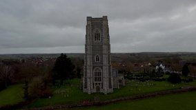 Drone footage of St Peter and St Pauls Church in Lavenham, Suffolk, UK