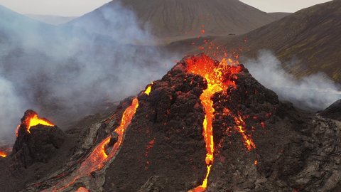 Geldingadalur volcano eruption in Reykjanes peninsula Iceland. Flowing lava and craters.