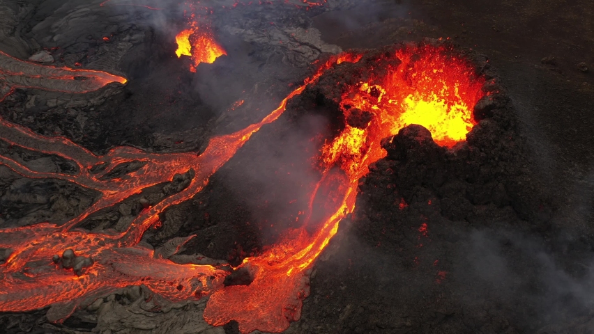 Geldingadalur volcano eruption in Reykjanes peninsula Iceland. Flowing lava and craters. | Shutterstock HD Video #1069399711