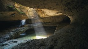 Unique ancient underground cave cavern picturesque multi-tiered waterfall Dagestan Russia best landmark. Beautiful untouched nature landscape, canyon gorge. Salta fall. Travel tourism. Gimbal sideways - Powered by Shutterstock - Get 15% off with code: PIKWIZARD15