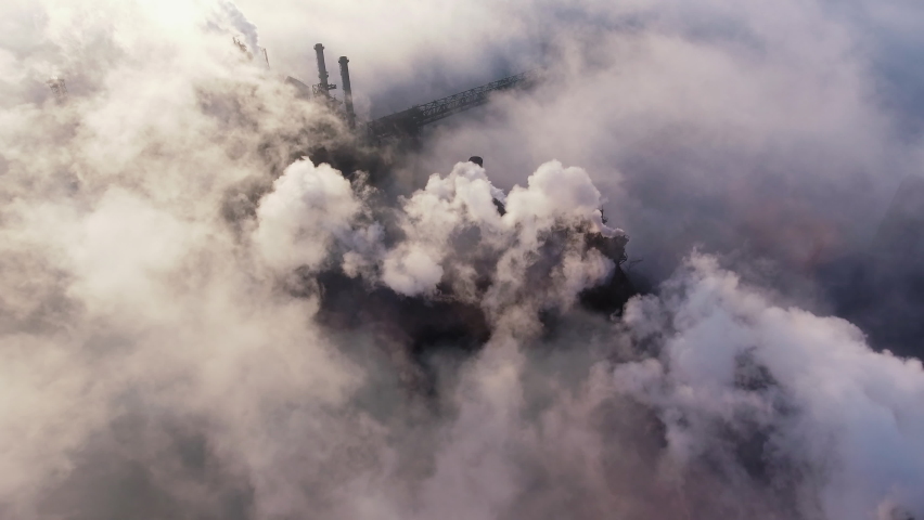 Industrial factory pollution, smokestack exhaust gases. Industry zone | Shutterstock HD Video #1069411612