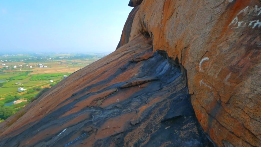Walking on the side of Yanaimalai, Elephant Hill in Madurai, India. Don