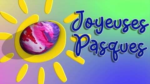 3D Easter motion graphic, with colorful painted egg spinning on a dial, coming to rest pointing at a bright and cheerful message in French saying 'Joyeuses Pasques'