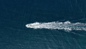 Croatia. Summer. Aerial view of floating yacht on blue Adriatic sea at sunny day.  Sail boat on sea surface. Seascape from drone. Travel and vacation video