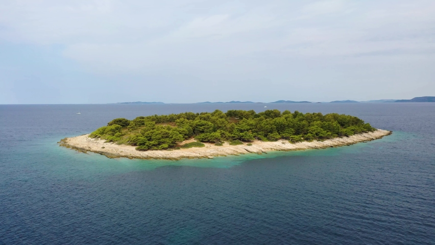 Croatia. Aerial view on water and rocks. Vacation and adventure. Beach and blue water. Top view from drone at beach and blue sea.