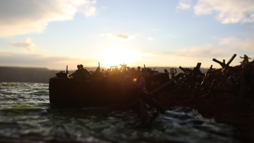 World War 2 reenactment (D-day). Creative decoration with toy soldiers, landing crafts and hedgehogs. Battle scene of Normandy landing on June 6, 1944. Selective focus