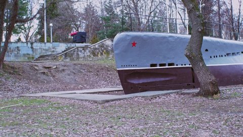 Old submarine. Submarine in the park. Monument submarine.