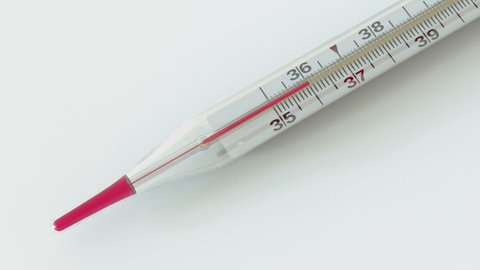 Temperature rises on the scale of the glass thermometer.
Close-up animation of temperature going up on a thermometer.