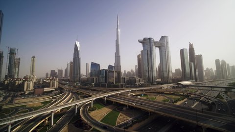 Dubai, United Arab Emirates - 16 March 2021: Aerial view of Dubai skyline with Burj Khalifa world's tallest building at sunset, Dubai, UAE.